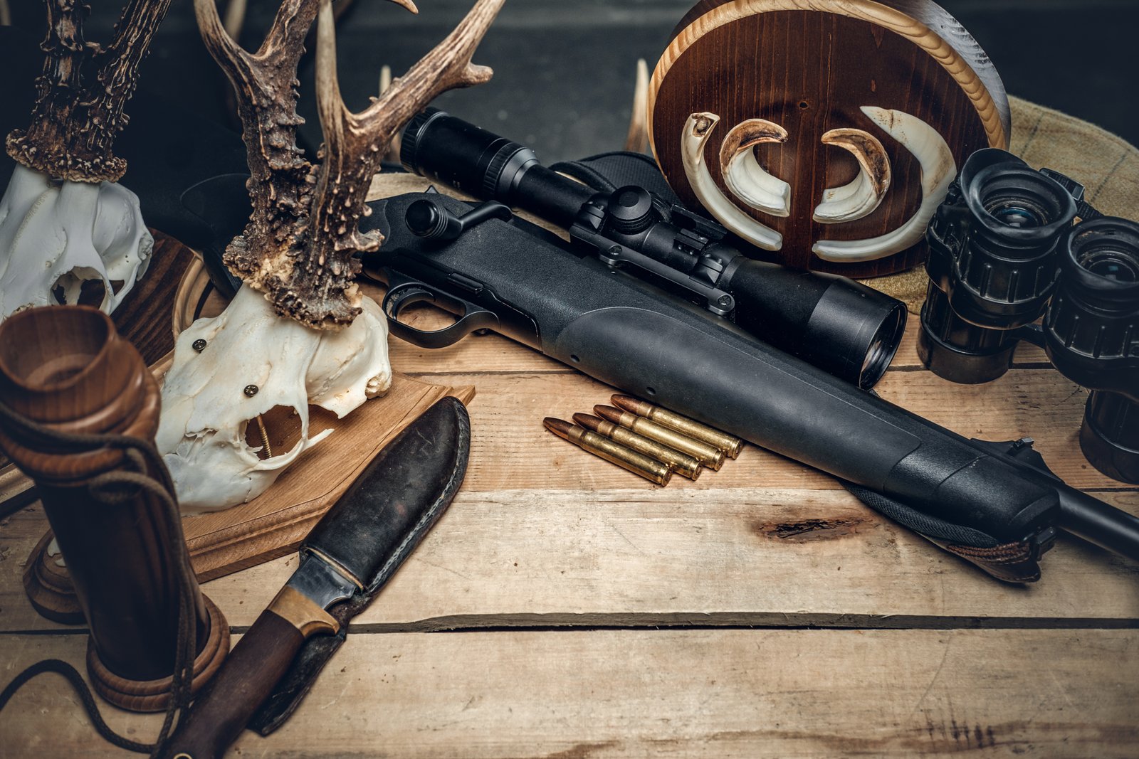 Essential winter hunting gear laid out for a hunt.